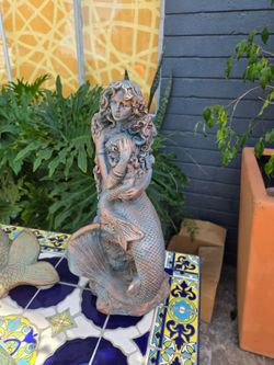 beautiful mermaid figure, made of cement