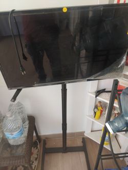 New tv ruko with remote plus stand