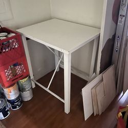 Solid wood table top with metal frame