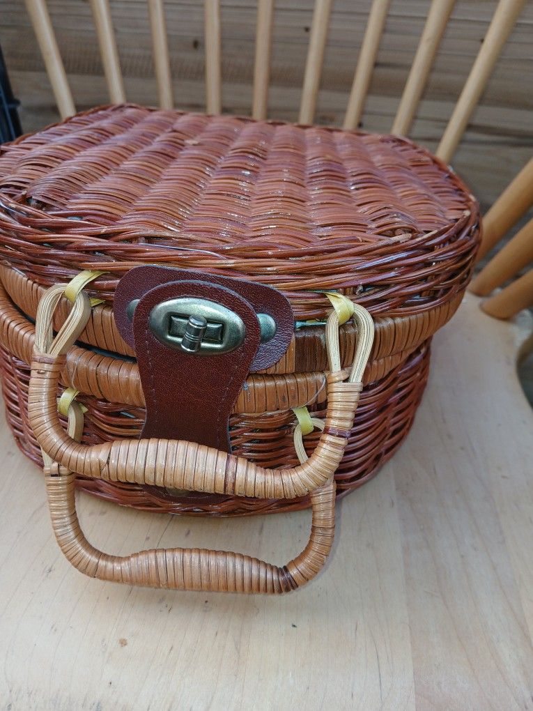 handwoven wicker picnic basket with a hinged lid and an internal fabric liner featuring a green and purple olive branch ( Only A Donation)