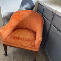 RARE VINTAGE designer Martin Brattrud Orange Crushed Velvet 1970 Russet Armchair Rolling Wheels mod style  24” width  Height 30”  Chair height 16”  On