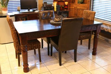 Solid Wood dining table with 4 chairs.