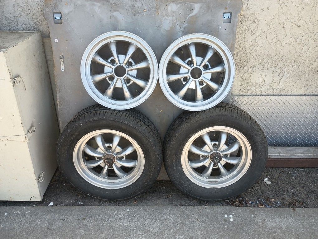 Set of Four Silver Spoke Empi Eight Spoke Style VW Wheels and Two Good Tires