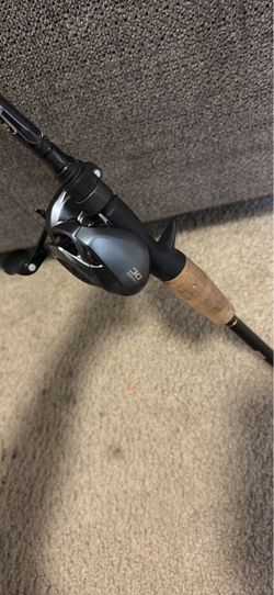 Shimano Curado DC left handed reel and a Johnny morris signature series