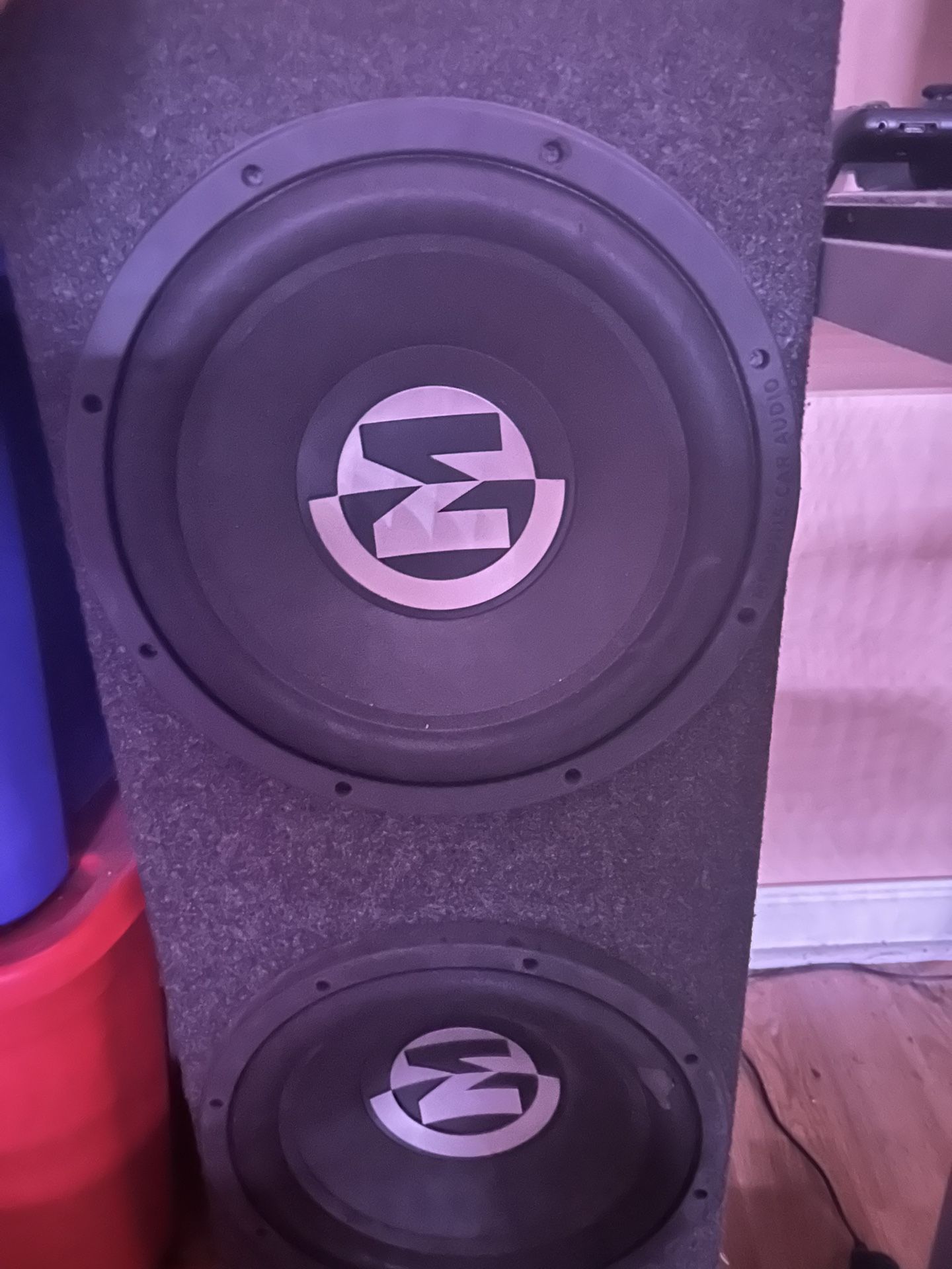 Two 15-PR10D4V2 - Memphis Power Reference 10" DVC 4 ohm Subwoofers in a sealed box with a Kenwood KAC-7025 500 RMS WATT amp.