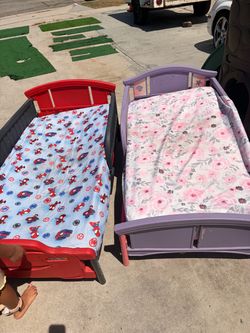 Two Toddler Beds Red and Purple