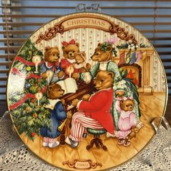 Vintage Avon collectible porcelain plate 8”  “Together for Christmas”  22k gold trim 1989