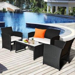 Rattan Outdoor Sofa with Black Cushions and Steel Frame