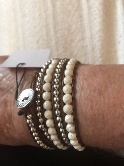 Women’s white stone and silver zinc bracelet
