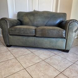 Love Seat - Faux Leather, Unique style, no rips, tears, or damage, very clean and comfortable!