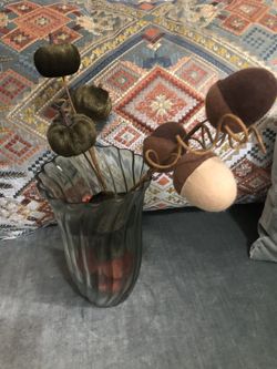 Elegant glass vase with fabric-covered stems, perfect for home decor