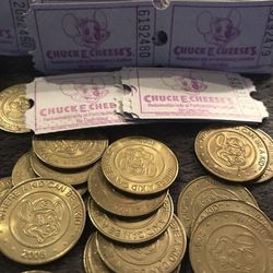Chucky Cheese tokens and tickets
