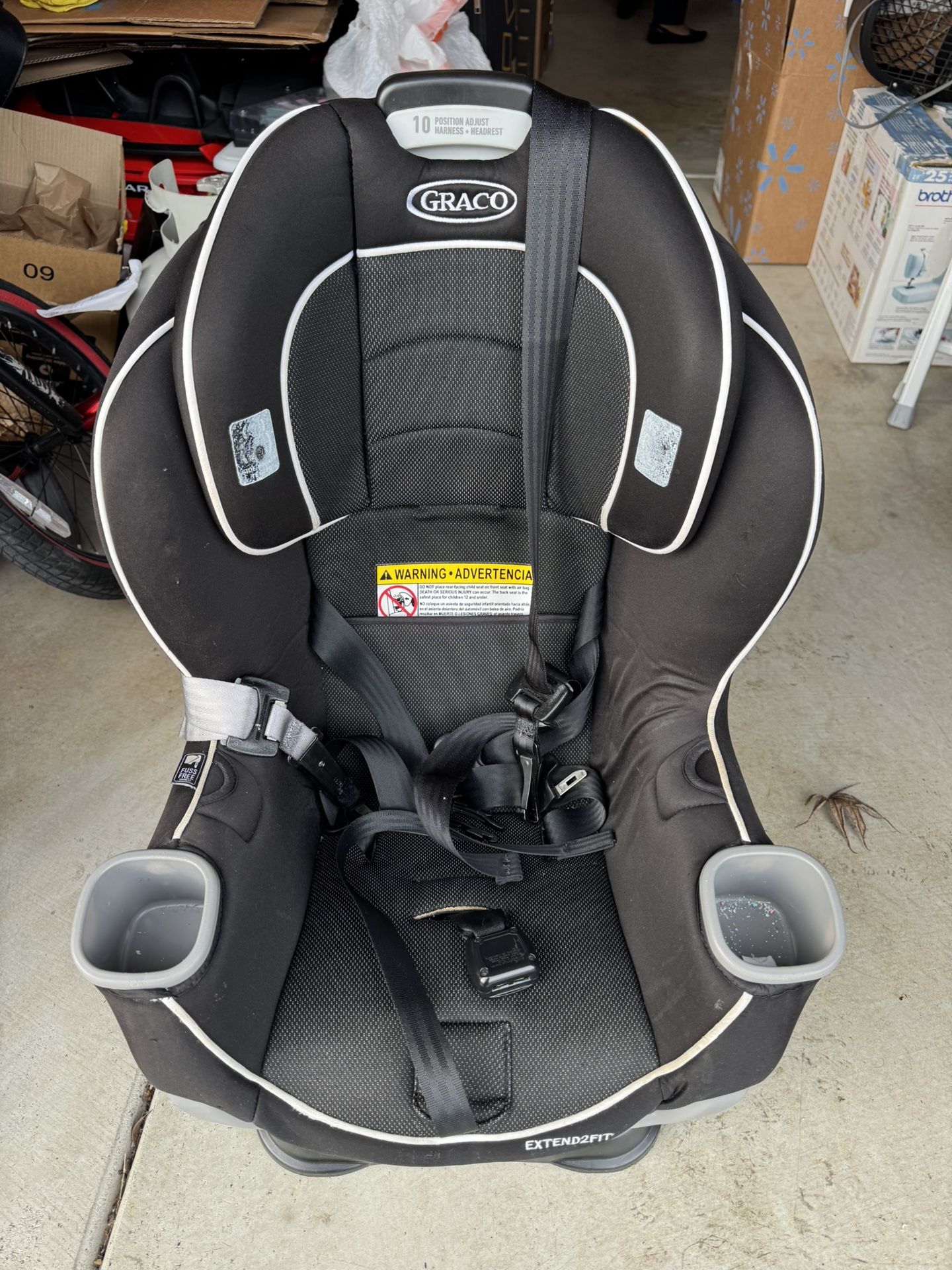 Two items Exercise Bike & Car Seat