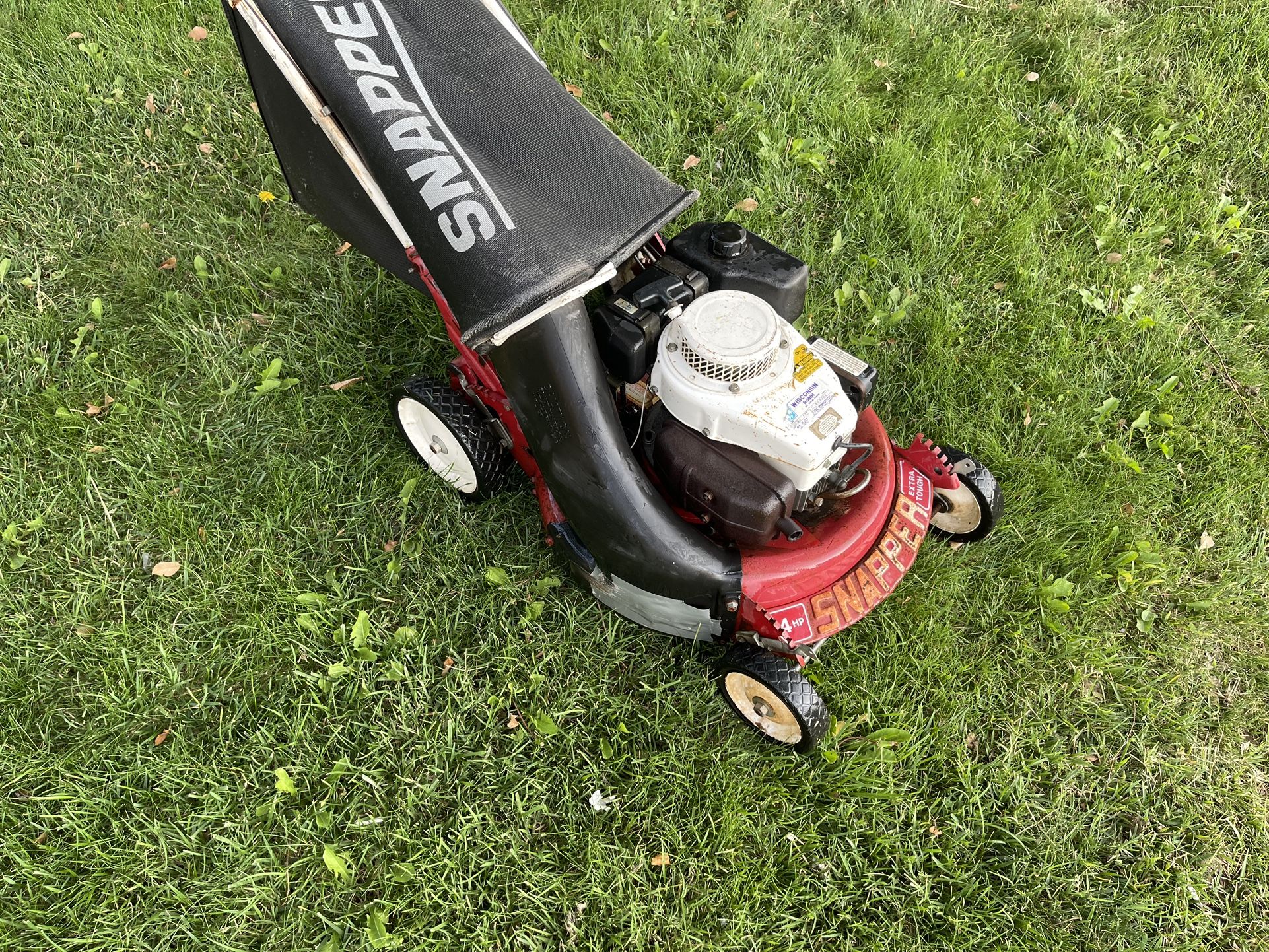 Snapper 2 cycle lawn mower, older or vintage mower.