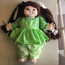 Handmade plush girl doll with long pigtails