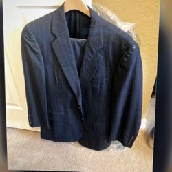 Man’s Dark Blue Pinstripe Suit