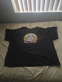 Look at Description Retro "Never Forget" Game Boy T-Shirt – Size Unknown