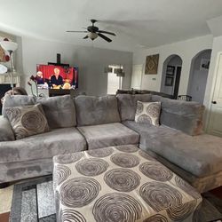 Beautiful gray two-piece with ottoman from Ashley furniture