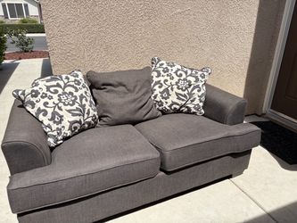 Gray Fabric Loveseat with Throw Pillows