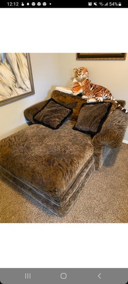 Animal Print Loveseat And Chase With Pillows