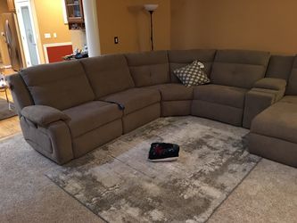 Lightly used powered reclining sectional set