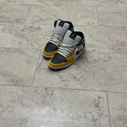 Jordan 1 Mid "Yellow Ochre"