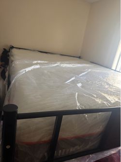 Full size bunks top and bottom… mattresses still brand new with the plastic  $600 obo
