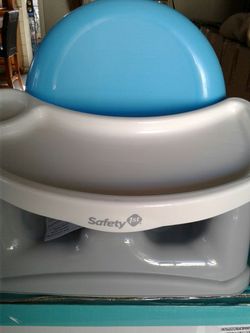 Booster seat with swing tray