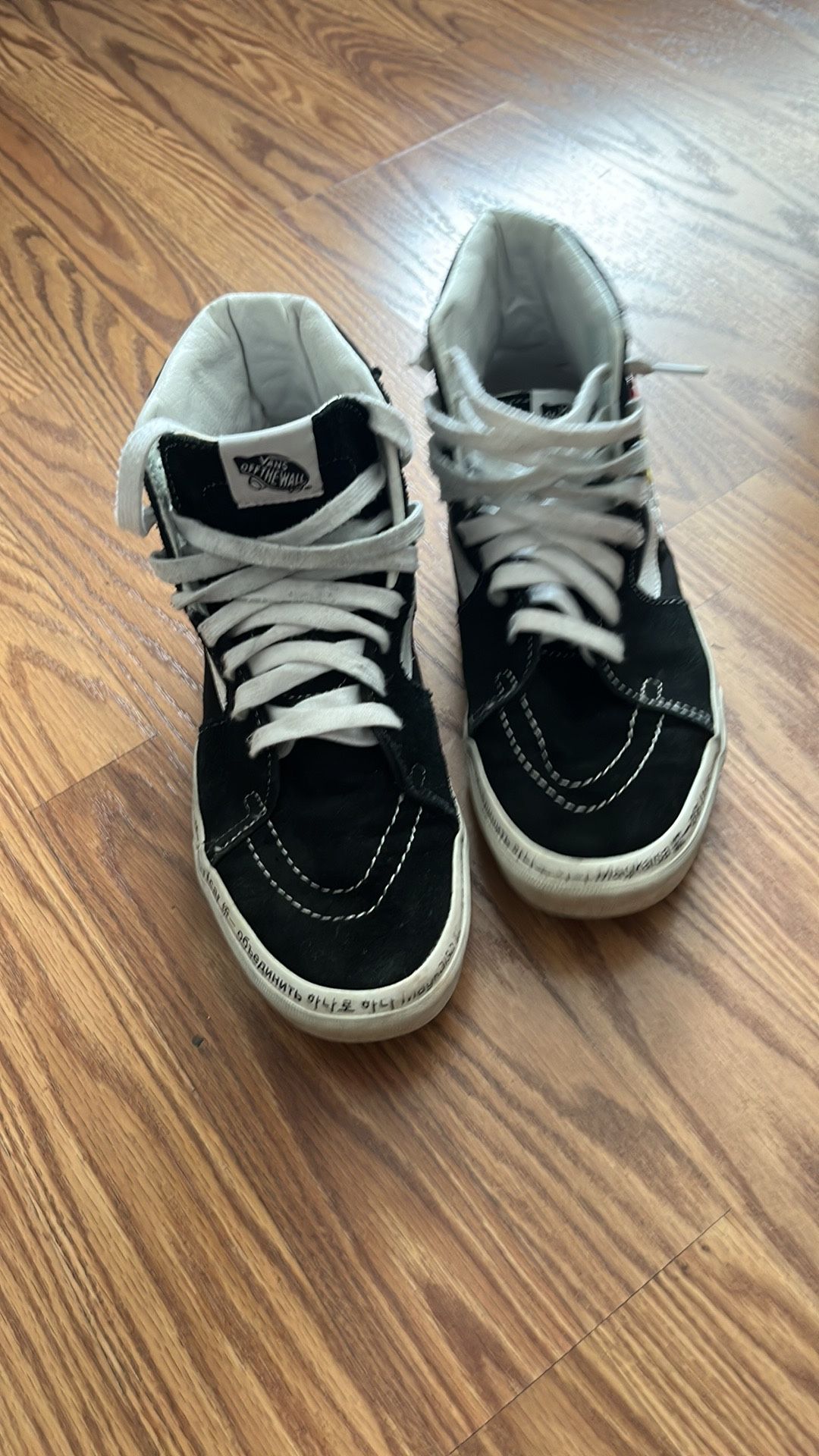 Vans Black and White High-Top Sneakers