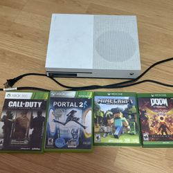 Xbox One S with four games