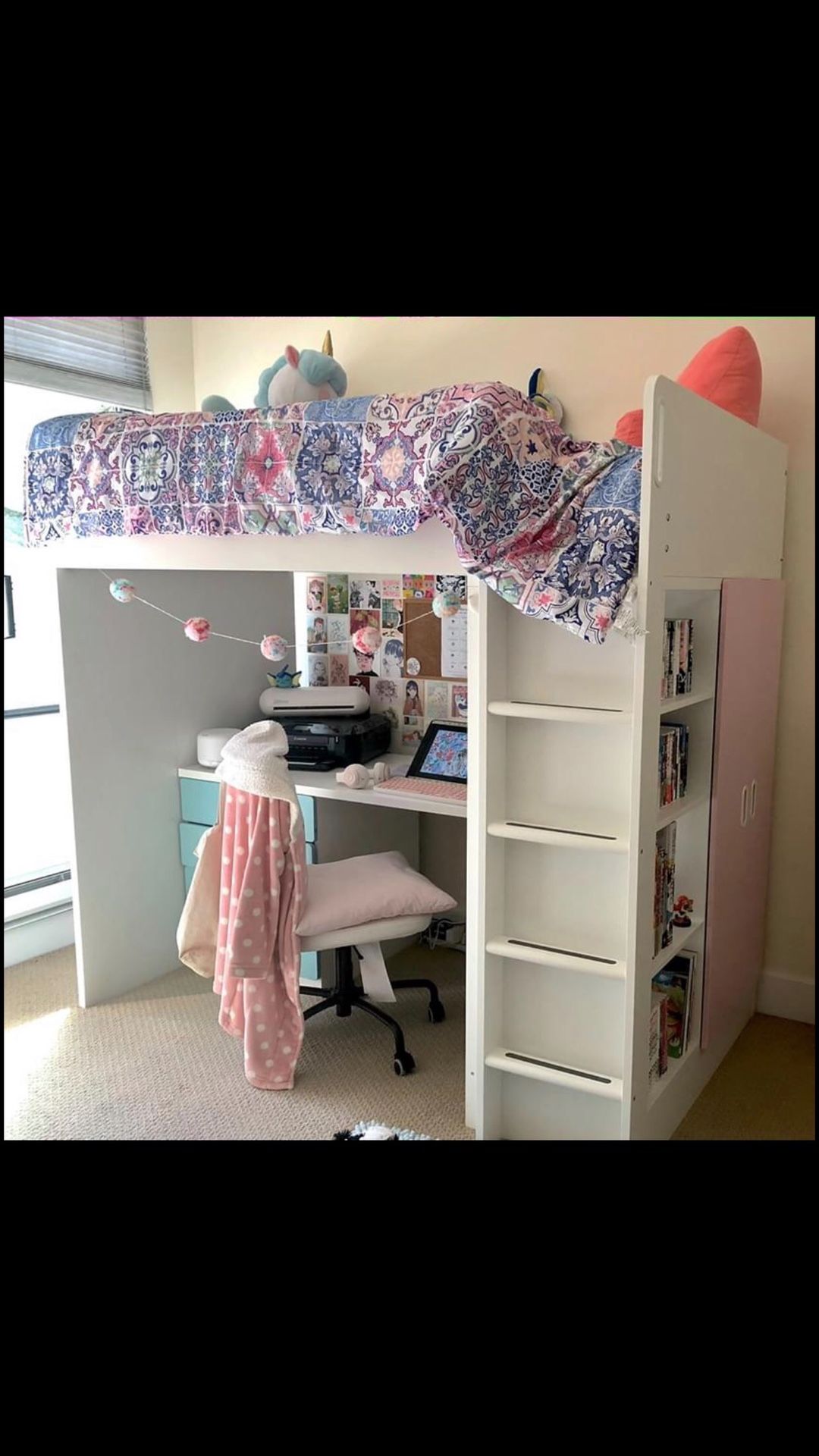 A loft bed with desk