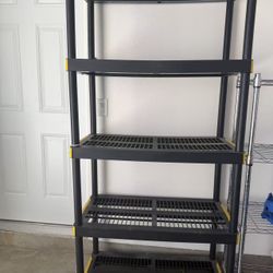 Plastic storage shelving, perfect for organizing boxes, tools, and other household or garage items. Moving out and priced to sell quickly.