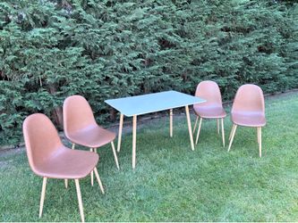 5 piece dining set table and 4 brown chairs