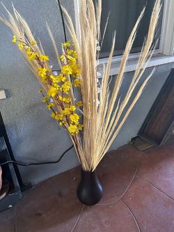 Wood vase with artificial flowers