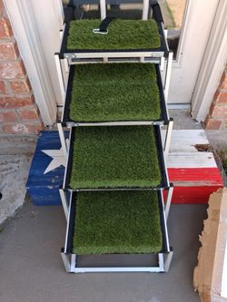 New Open Box 4-step Folding Pet Staircase with a metal frame and artificial turf treads