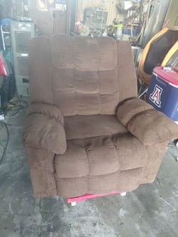 Oversized brown recliner