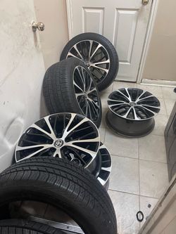 235/45/18 : set of 5:: 5 rims and 4 tires 3 tires Goodyear and one Yokohama: all very good tread