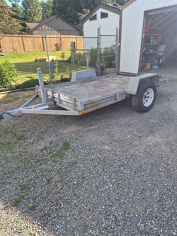 Tilt deck trailer