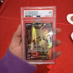 2015 POKEMON TYRANITAR GRADED CARD