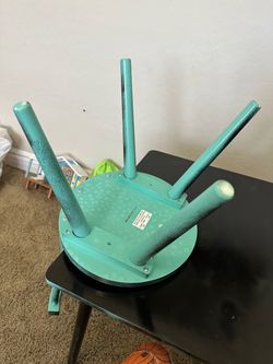 A Childrens table with three chairs very solid made well