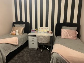 2 Twin Beds: Black Upholstered Beds with Sealy Mattresses