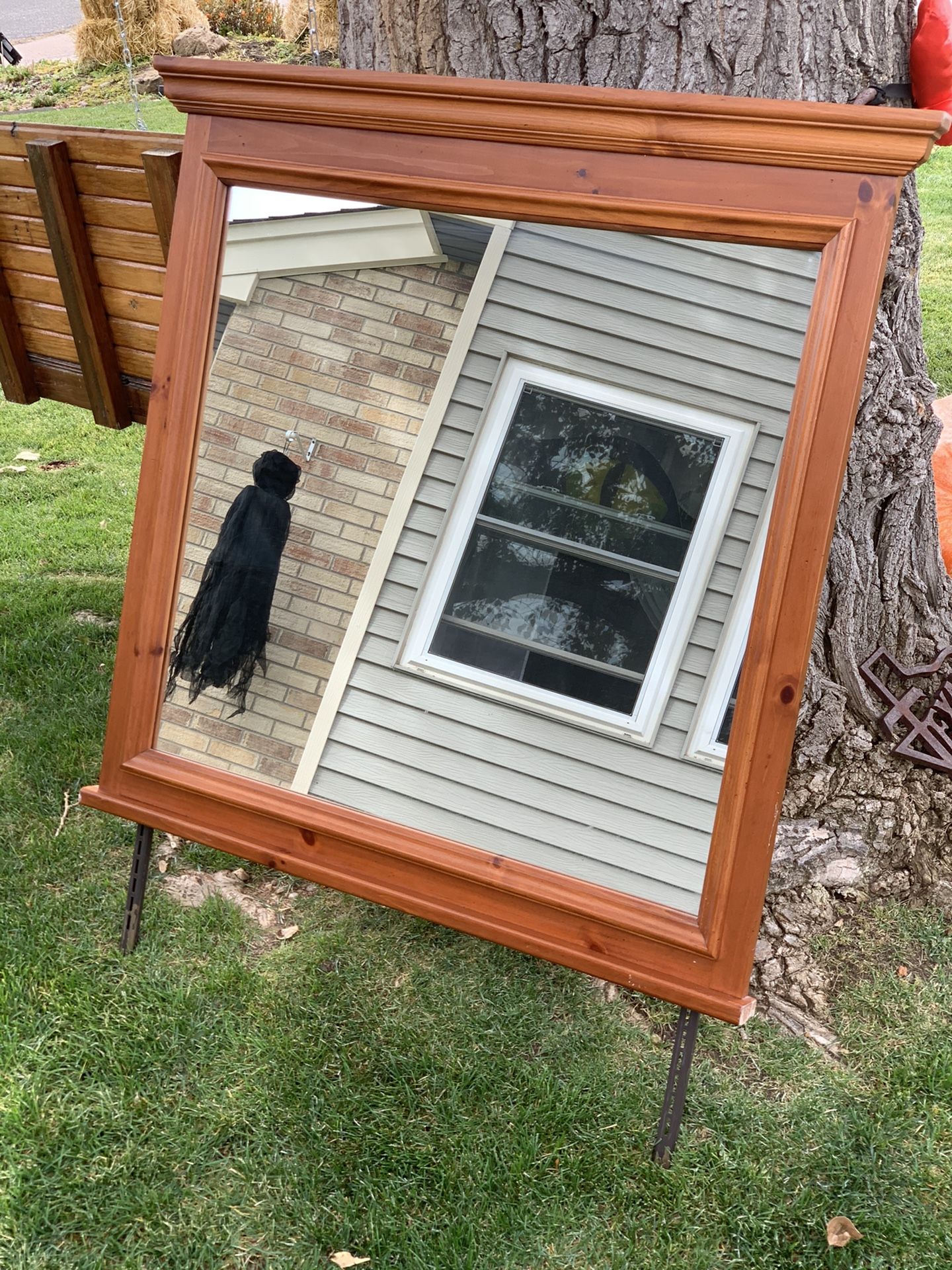 Large wood framed mirror