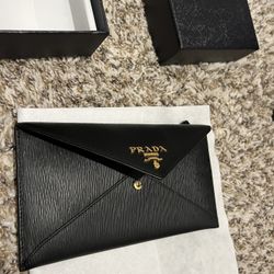 NEW AUTHENTIC PRADA CLUTCH WITH RECEIPT AND ALL PACKAGING