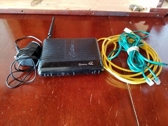 Quest wireless router with 2 ethernet cable and power adapter.