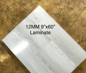 12MM HEAVY DUTY MOISTURE RESISTANT LAMINATE .EASY TO INSTALL UNICLIC INTERLOCKING SYSTEM ! 80 Hour PROTECTION  9”x60” 