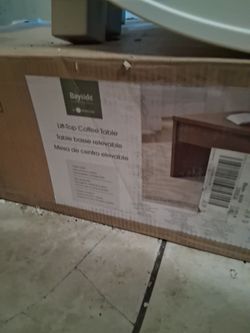 Brand new coffee table still in the box