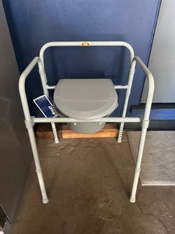 Brand new bedside commode