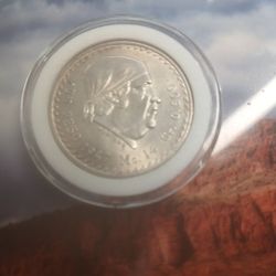 1947 silver peso (uncirculated condition) 