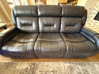 Leather reclining charcoal couch -Las Vegas, NV