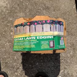 Two rolls of cedar lawn edging